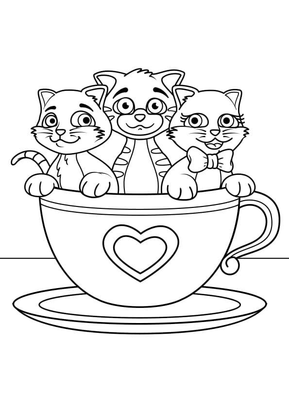 Три котенка в чашке