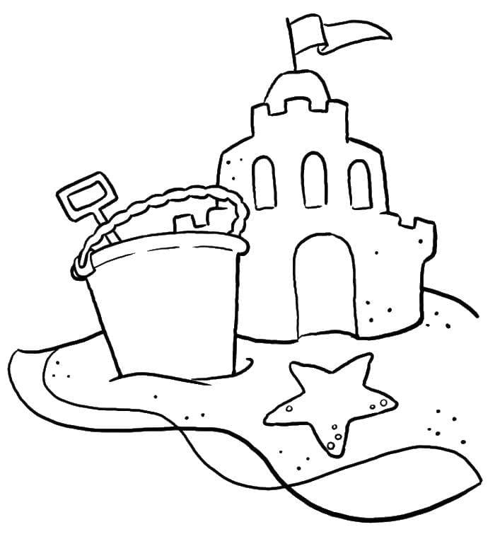Песочный замок, ведерко и морская звезда.