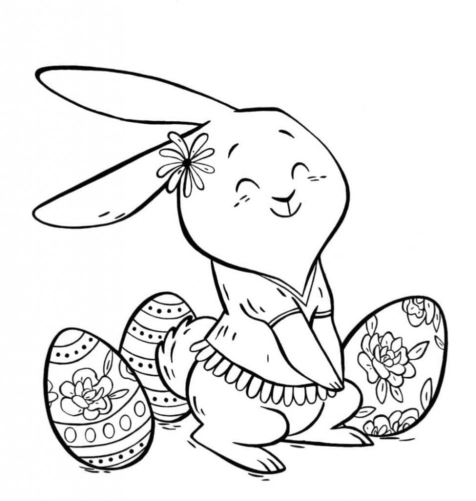 Милый кролик и пасхальные яйца.