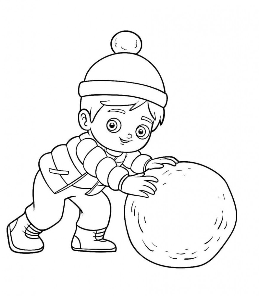 Мальчик лепит большой снежный шар